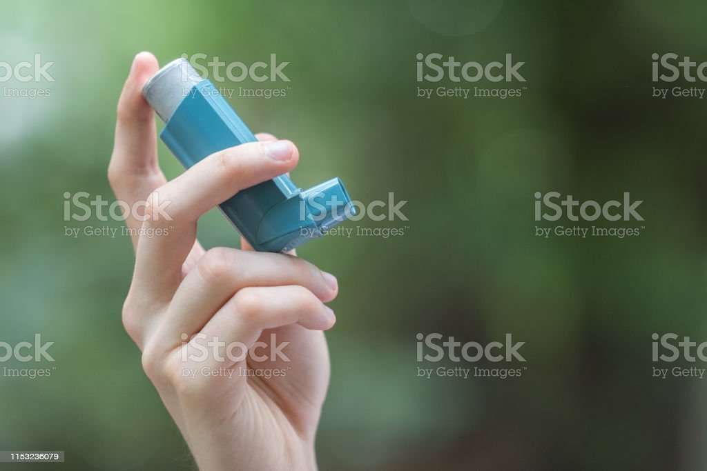 Asthma Medecine Inhaler Holded By A Man Stock Photo ...