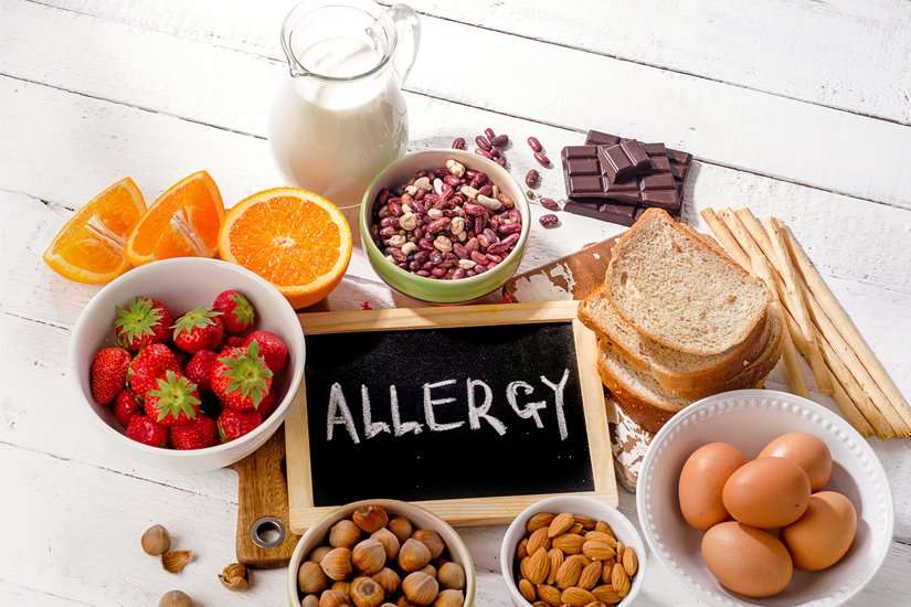 How to tell the difference between a food allergy or ...