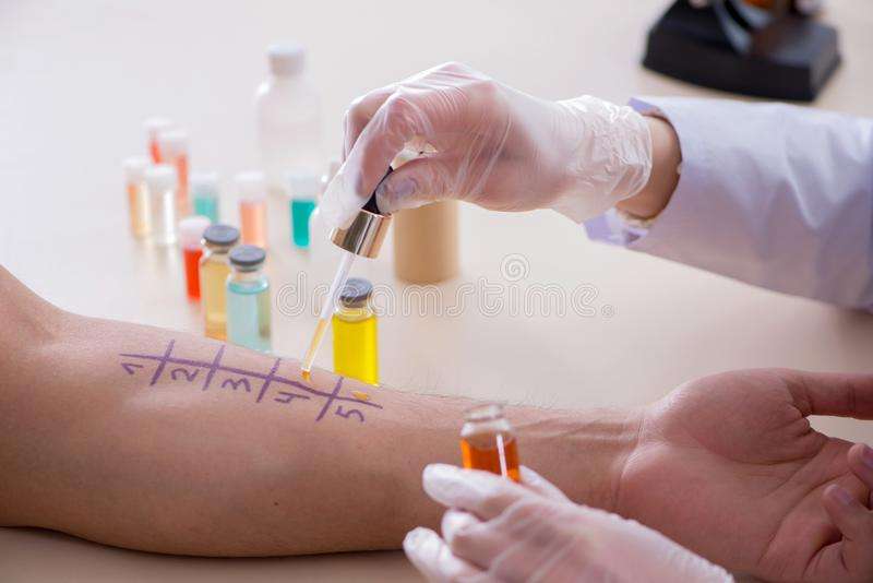 The Doctor Testing Allergy Reaction Of Patient In Hospital ...